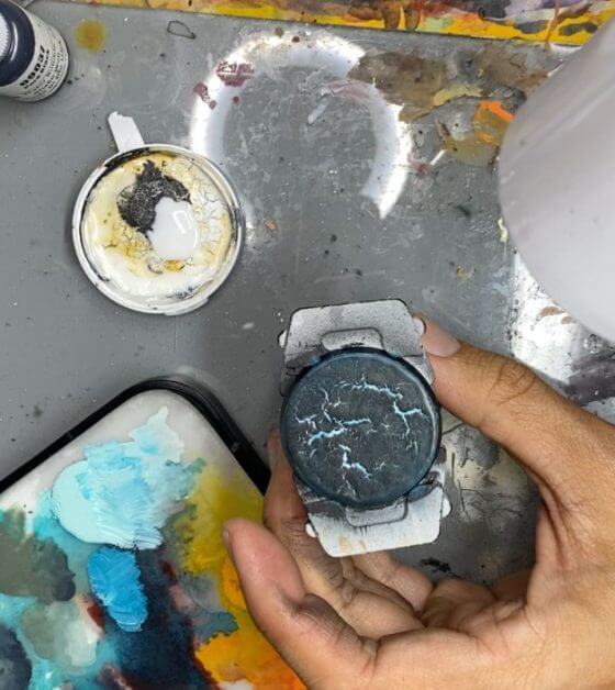 drying glue cracks the black paint