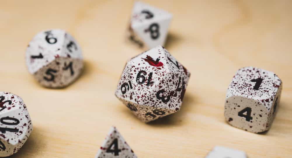 Best Metal Dice Sets? Forged Gaming Dice Sets for DnD and RPGs (Review) - metal dice set review - blood close up