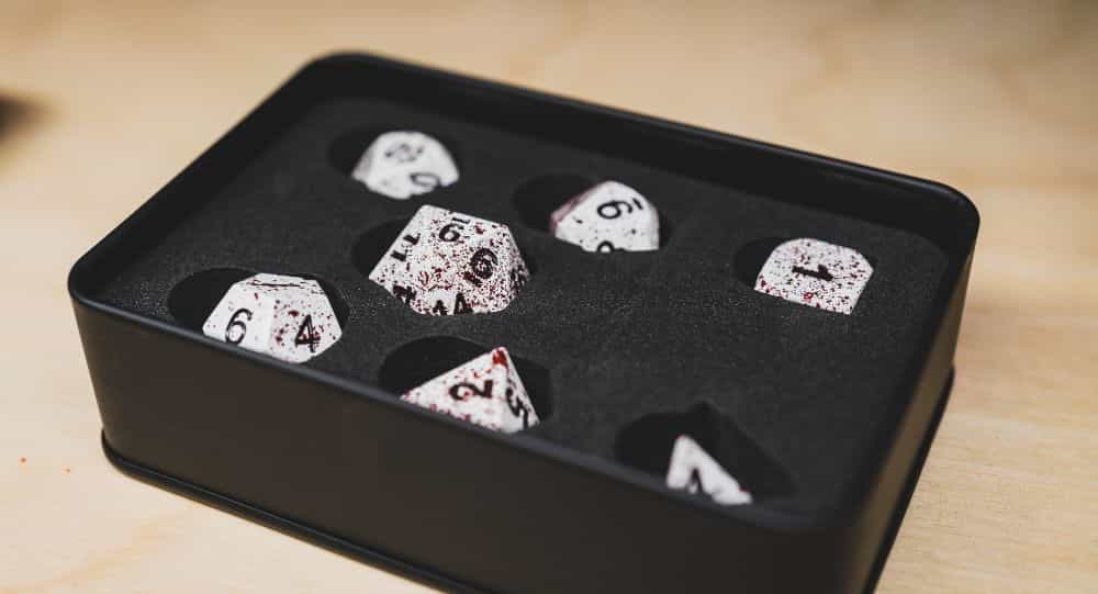 Best Metal Dice Sets? Forged Gaming Dice Sets for DnD and RPGs (Review) - metal dice set review - dice in foam