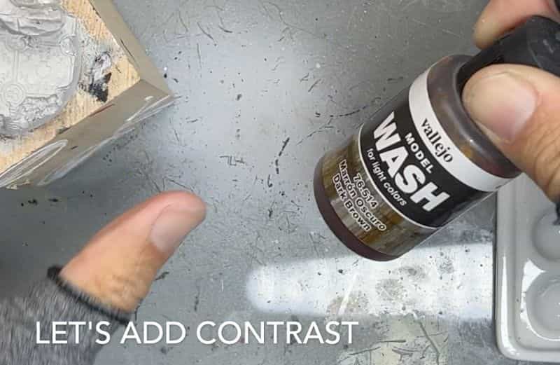 How to paint stone bases for miniatures - stone miniature bases - painting resin bases - how to paint resin miniature bases - stone base with OSL - brown wash shade