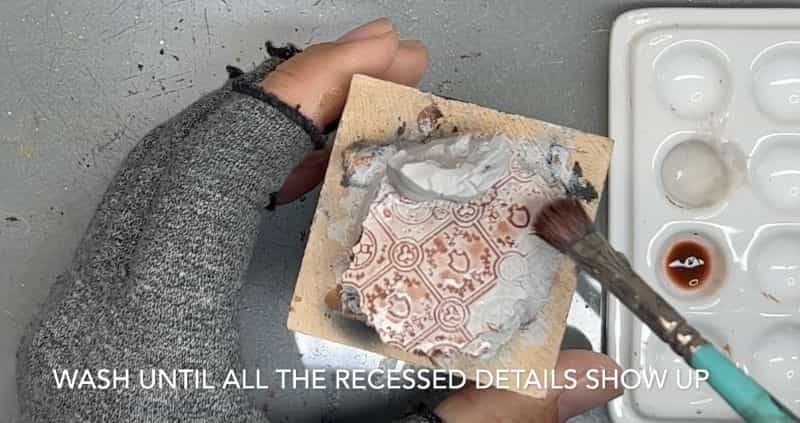 How to paint stone bases for miniatures - stone miniature bases - painting resin bases - how to paint resin miniature bases - stone base with OSL - apply brown wash