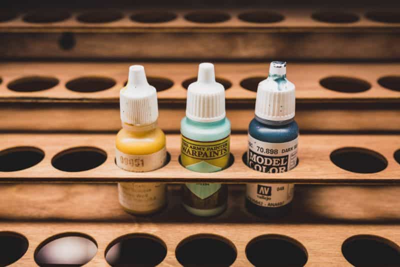 Wall mounted paint rack and organizer - best wall mounted paint rack - paint racks for walls - dropper bottles in shelf