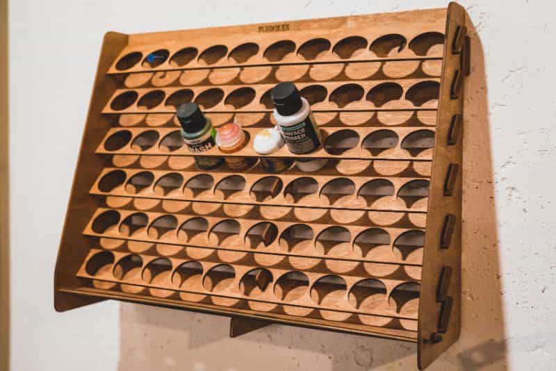 The Ideal Miniature Painting Room (Philosophy and Designer Tips) - dedicated hobby space - best hobby room setup - vertical wall display rack organizer for hobby rooms