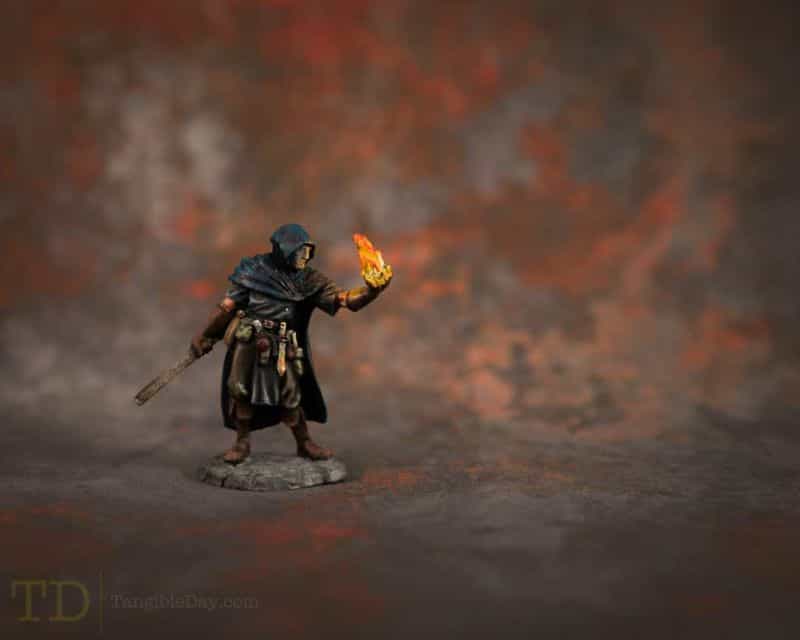 How to paint fiery effects with ChatGPT guidance, example OSL painted mage miniature with fire effects 