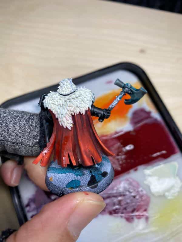 Understanding Acrylic Paint for Miniature Hobbies: Uses, Types, and Best Picks (Guide) - What is acrylic paint, its uses, and best types - blending paint on a space marine cloak glazing technique demonstration