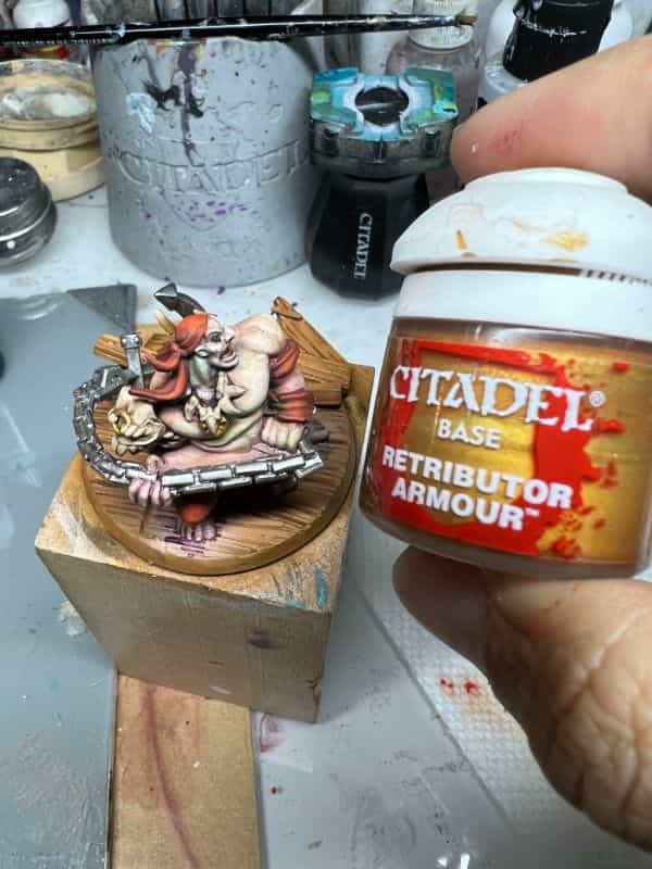 How to Paint a 3D Printed Resin Miniature A-to-Z (Flesh, Cloth, and Metal) - how to paint myminifactory model - retributor armour gold metallic paint bottle