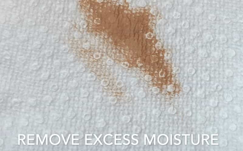 How to Dry Brush Miniatures & Models - wipe excess paint and moisture on a paper towel