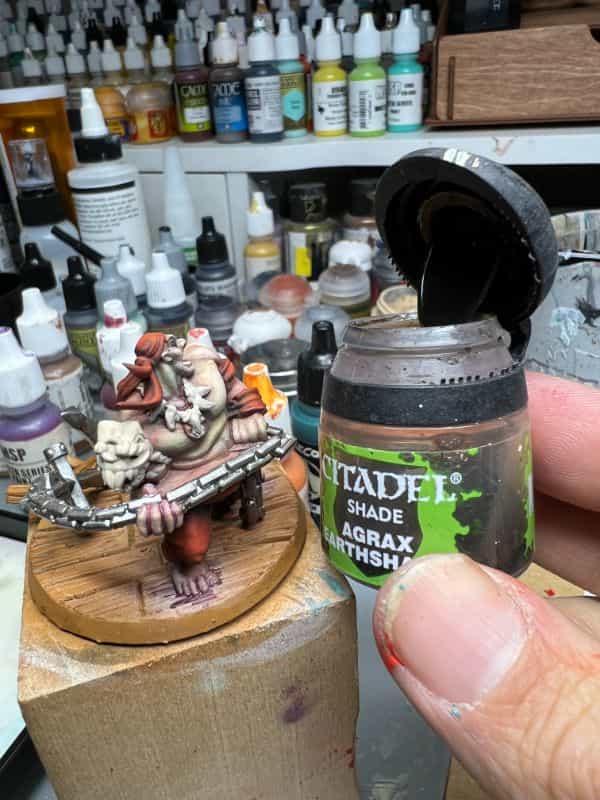 How to Paint a 3D Printed Resin Miniature A-to-Z (Flesh, Cloth, and Metal) - how to paint myminifactory model - agrax earthshade wash from citadel cap open on pot