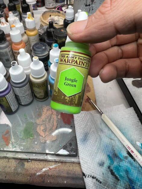 How to Paint the "Pheromancer" Conquest Miniature (Low Stress Method) - painting with washes - how to paint with less stress - conquest the last argument of kings - green detail color jungle green bottle