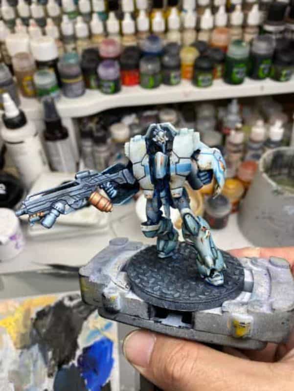 Is Miniature Painting Difficult? -  ways to overcome miniature painting difficulties - is it hard to get started painting miniatures? - infinity model painted with oil color