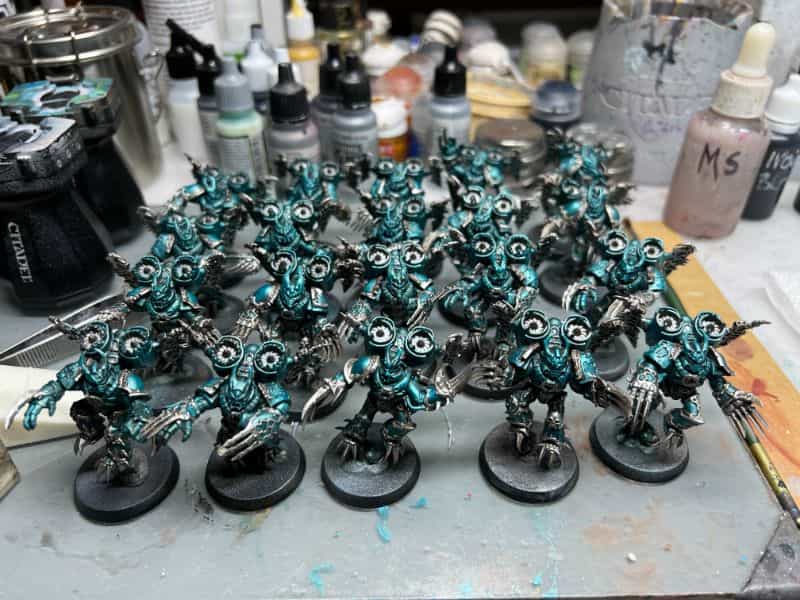 Alpha legion painting in progress in metallic teal and green tourquoise