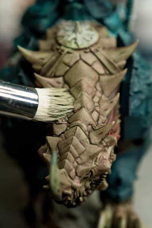 Zenithal Dry Brushing to "SlapChop" Paint Miniatures - close up of a drybrush on the scales of an age of sigmar miniature, work in progress painting