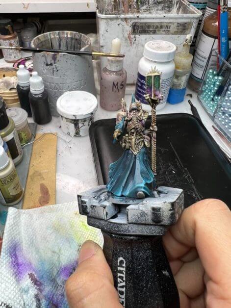 How to Paint the "Pheromancer" Conquest Miniature (Low Stress Method) - painting with washes - how to paint with less stress - conquest the last argument of kings - front photo of colored details added
