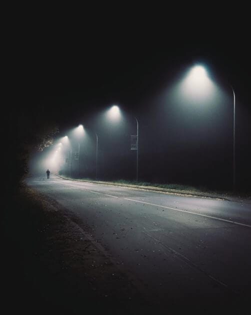 wide road with street lights - playing late at night