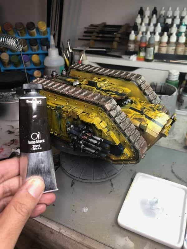 Three creative ways to use varnishes on painted miniatures - miniature painting varnish use - fun ways to use clear coat varnishes on miniatures and models - Forgeworld tank with oil wash imperial fist warhammer 40k