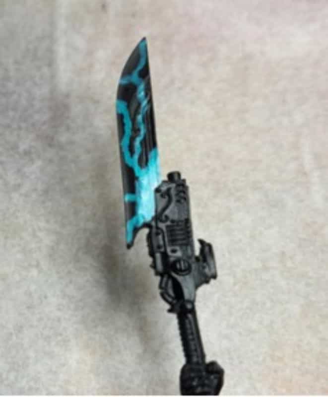 Power swords - how to paint power swords - painting power weapons warhammer - sketching lightning pattern on blade of sword