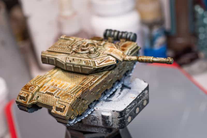 How to Paint Model Tanks (8 Basic Steps) - painting tanks - how to paint model tanks - scale model tank with oil wash applied, waiting for dry and cure