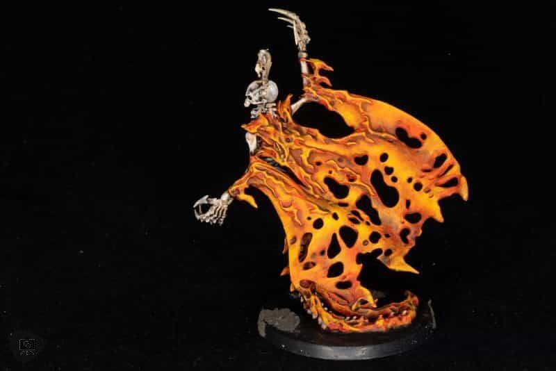 Yellow and orange cloak of a Warhammer 40k Necron model - airbrushed and hand painted