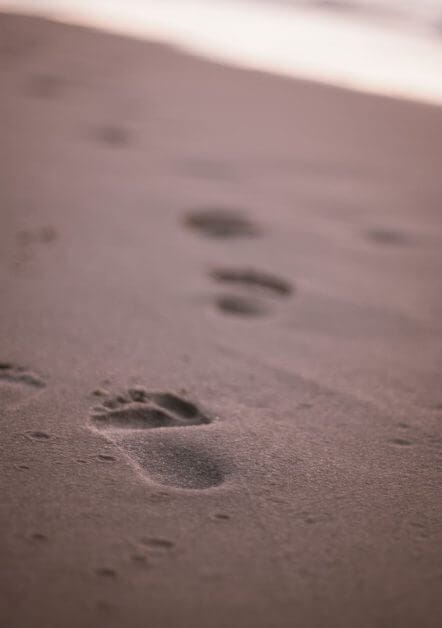 close up photo of footprints on sand - Hobby Writing and Intrusive Thoughts (Editorial) - Is writing a hobby 
