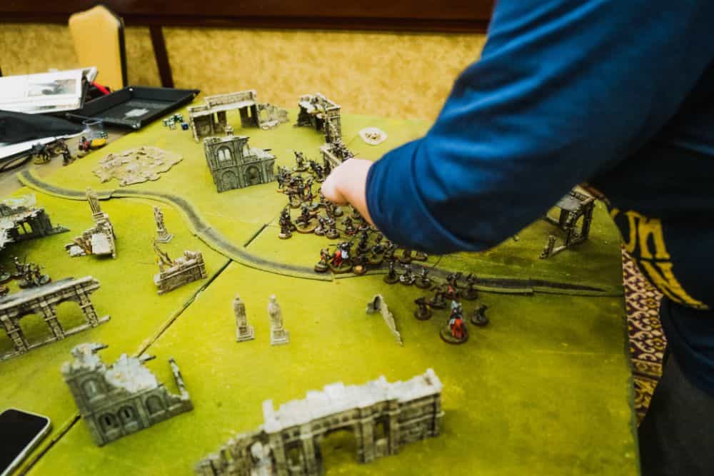 Hotel Room Miniature Painting (Travel Challenges, Tips, and Solutions) - travel tips for miniature painting away from home - Traveling and painting miniatures - wargaming at convention tabletop 