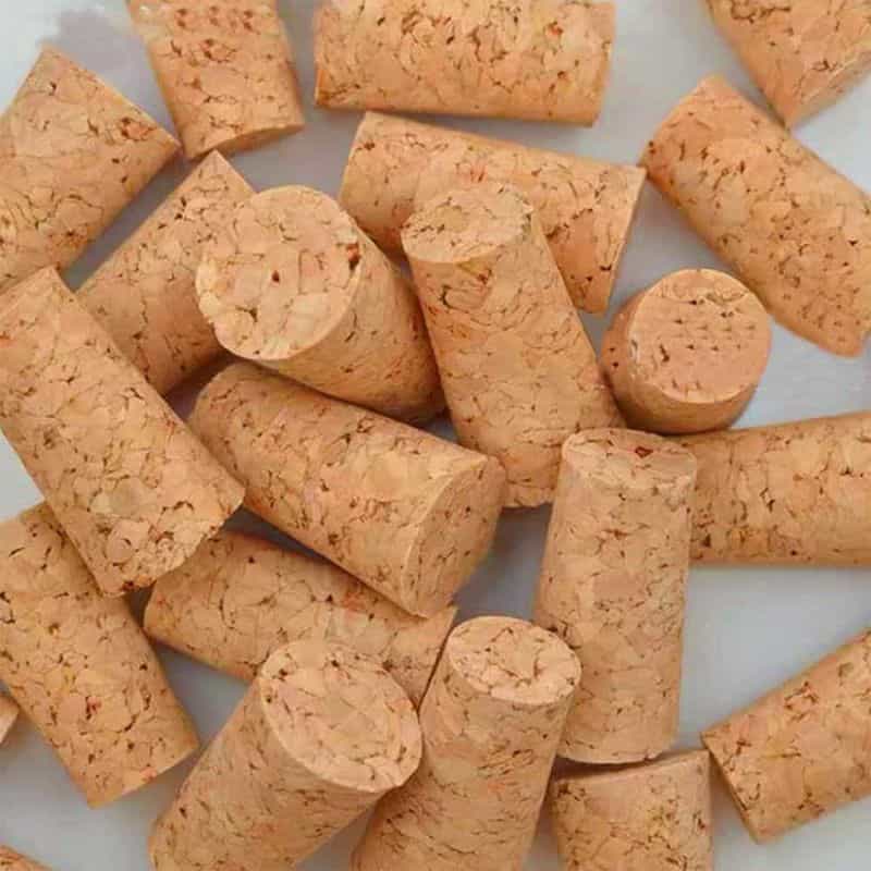 Miniature Basing Materials for Model Hobby Projects (Tips and Review) - best basing material for miniatures and models - wine cork stoppers in a pile