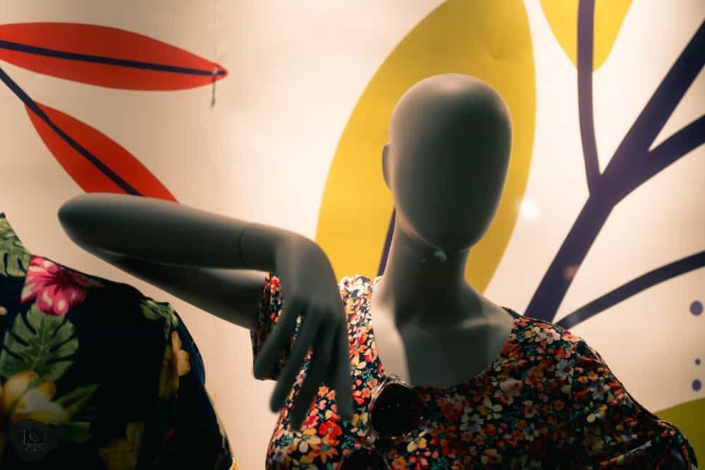 What is "Learned Helplessness"? Insights for Artists - a faceless mannequin against a bright background with yellow and red patterns