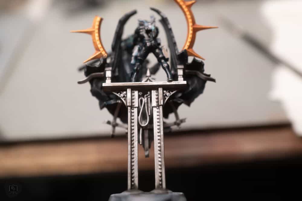 Redgrass games desk lamp review, redgrass games lamp review for painting miniatures, models, and art - High contrast photo of True metallic metal painting on a model