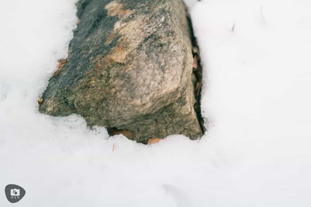 What is "Learned Helplessness"? Insights for Artists - a rock in snow melting around it 