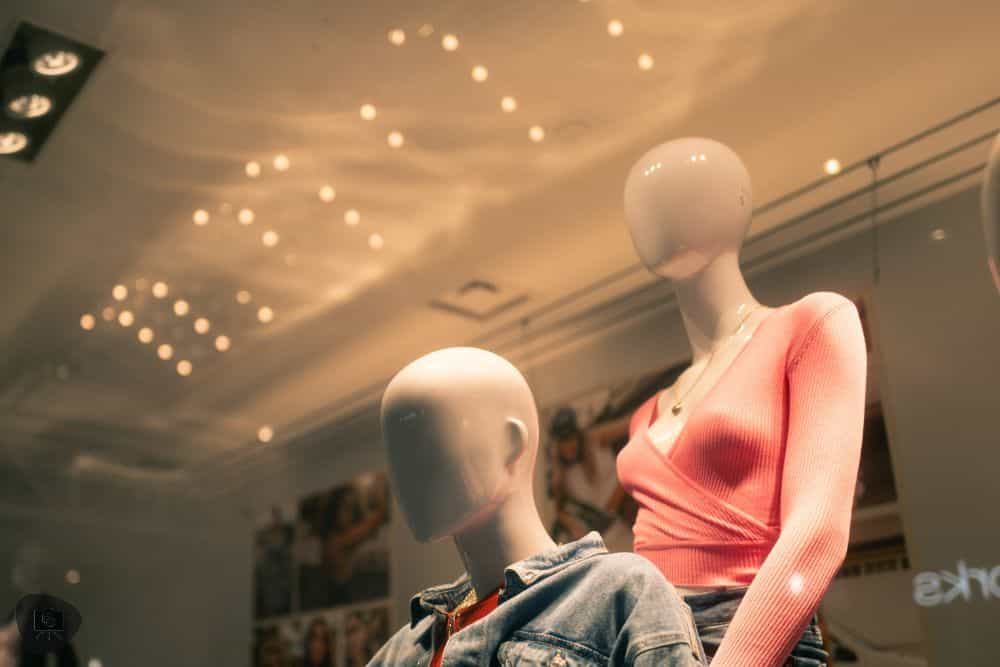 What is "Learned Helplessness"? Insights for Artists - two faceless mannequins with overhead lighting and spooky presence