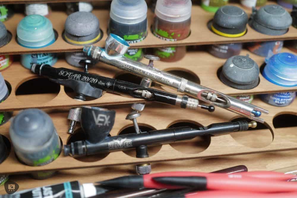 Badger Airbrushes: Best Beginner to Advanced Models for Painting Miniatures? - best badger airbrush for miniature painting - airbrush stable on shelf