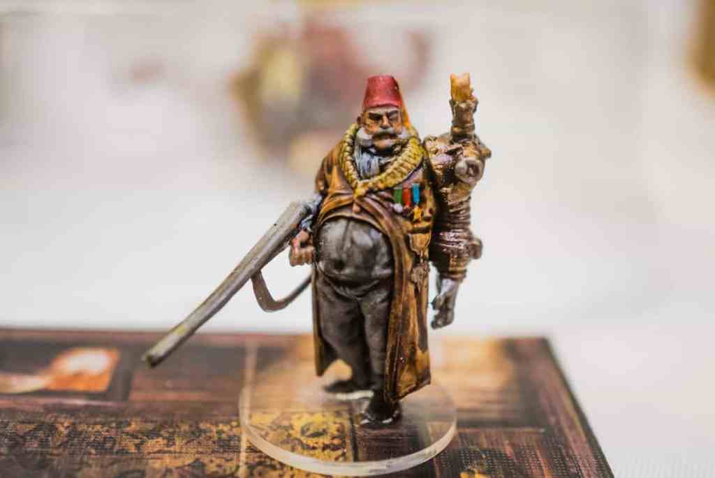Running a Successful Hobby Gaming Convention: The Hidden Magic and Mayhem Behind CaptainCon - Painted board game miniature by Craig