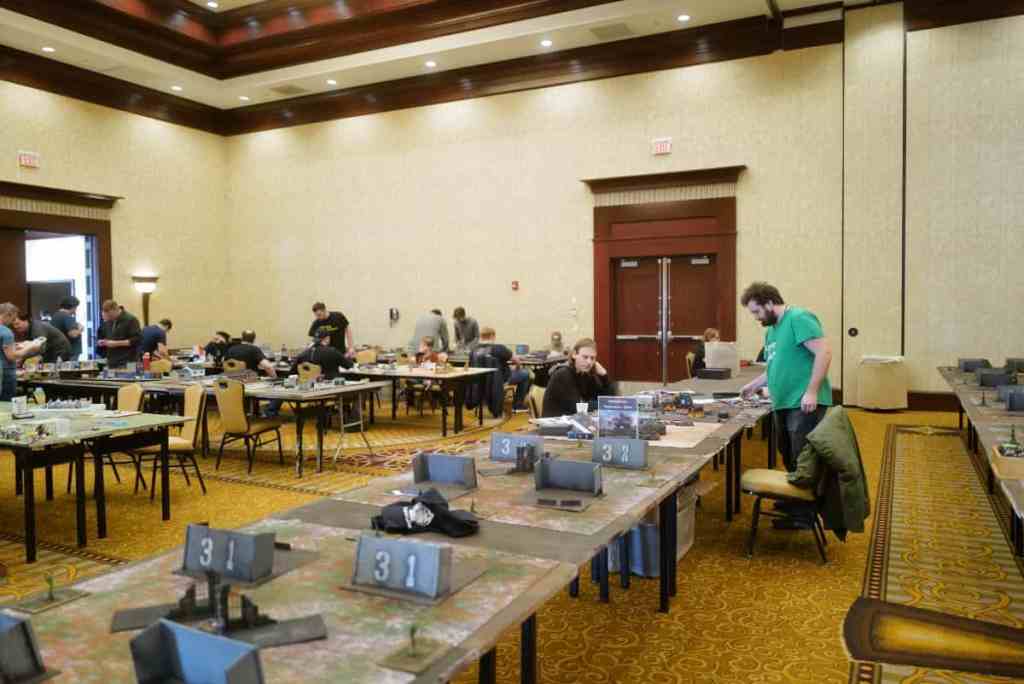 Running a Successful Hobby Gaming Convention: The Hidden Magic and Mayhem Behind CaptainCon - Empty convention hall with gaming tabletops