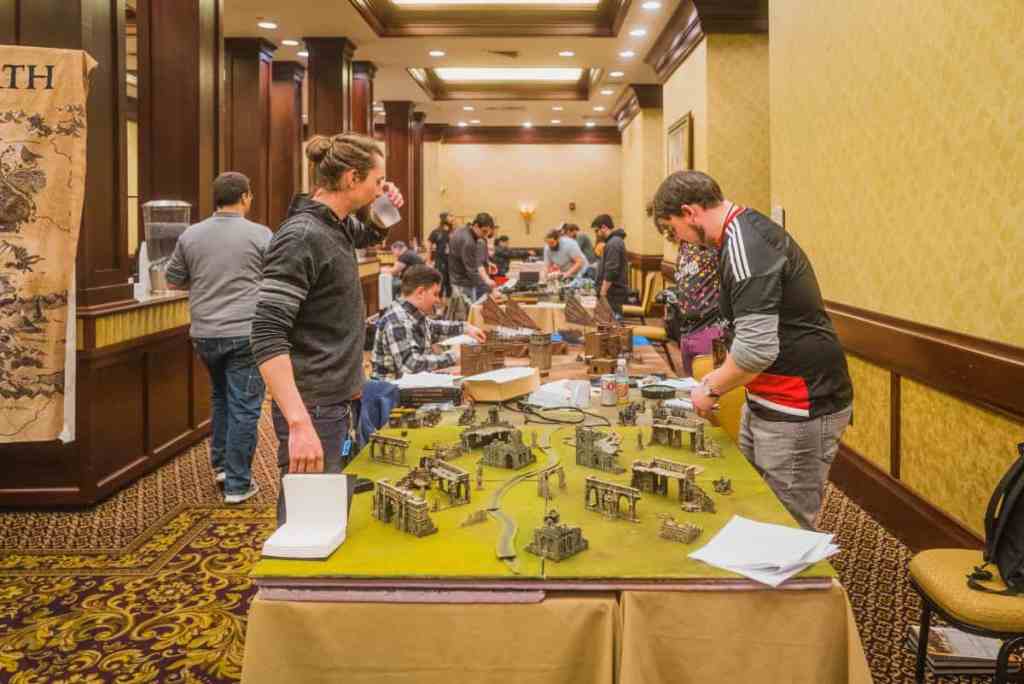 Running a Successful Hobby Gaming Convention: The Hidden Magic and Mayhem Behind CaptainCon - unwinding over a game of lord of the rings 