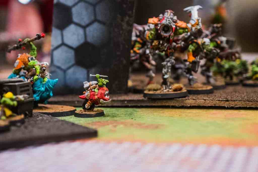 Running a Successful Hobby Gaming Convention: The Hidden Magic and Mayhem Behind CaptainCon - Age of Sigmar Orc squig on tabletop miniature table
