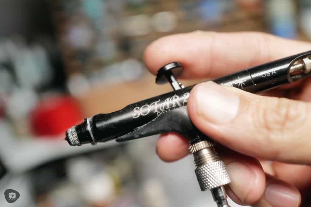 Badger Airbrushes: Best Beginner to Advanced Models for Painting Miniatures? - best badger airbrush for miniature painting - Forward grip and trigger on Sotar 2020 airbrush for precision spray pattern control