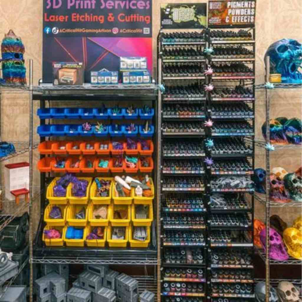 Running a Successful Hobby Gaming Convention: The Hidden Magic and Mayhem Behind CaptainCon - Hobby Model Paints rack for vendor