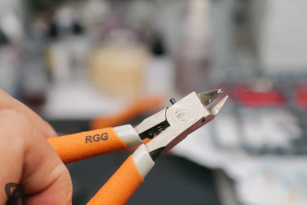 My over handed grip on the RGG precision nipper. Close up of the RGG logo on the handle and the metallic pivot point.