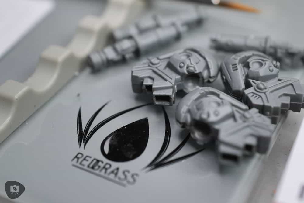 Redgrass Games Sprue Cutter and Precision Nipper Review - RGG sprue cutter RGG precision nipper - Tau modeling parts subassemblies on a glass palette