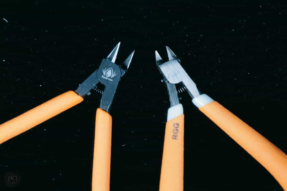 Redgrass Games Sprue Cutter and Precision Nipper Review - RGG sprue cutter RGG precision nipper - side by side shot of the two tools on a black backdrop