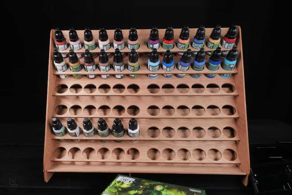 How to Paint Plastic Miniatures (Step-by-Step) - Green Stuff world paints in my hobby storage display rack