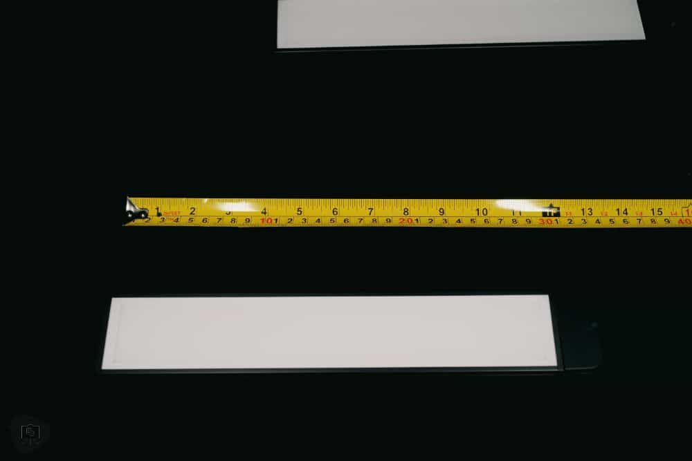 Lume Cube Flex Light Pro: A Review for Hobbyists and Creatives - Tape measure next to the LED panel showing the length and size of the light