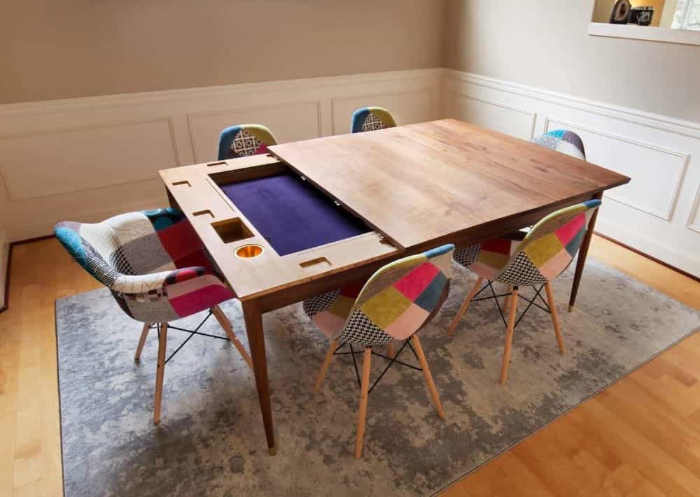 Elevate Your Tabletop Gaming Experience with a Board Game Dining Room Table (Editorial) - colored chairs around the gaming table with cover partly removed