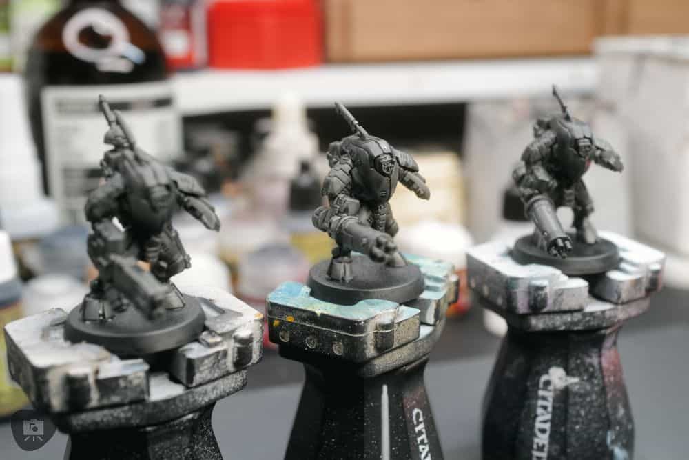 How to Paint Plastic Miniatures (Step-by-Step) - primed miniatures side by side
