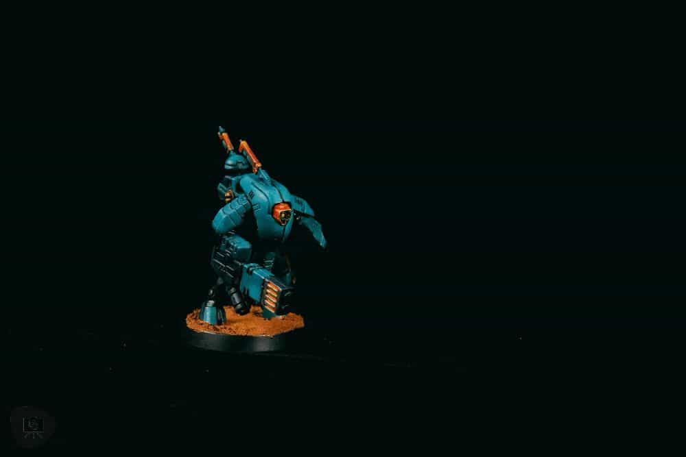 How to Paint Plastic Miniatures (Step-by-Step) - final studio photograph of the painted plastic miniature with a black background