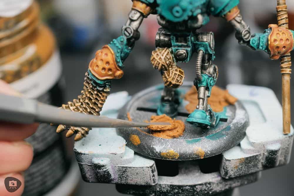 Zenithal Dry Brushing to "SlapChop" Paint Miniatures - applying vallejo texture mud to the miniature's base