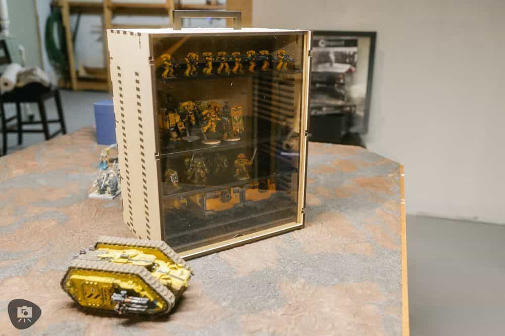 Best Budget Magnetic Miniature Carrying Case - The transport case on my wargaming tabletop near a model tank