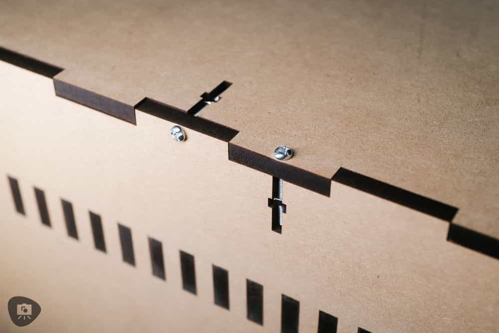 Best Budget Magnetic Miniature Carrying Case - Screwed in bolts into the MDF walls hold the unit together very well, no gaps