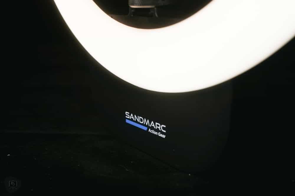 saSandmarc wireless LED Ring light review - best portable ring light for content creation - close up of the ring light logo