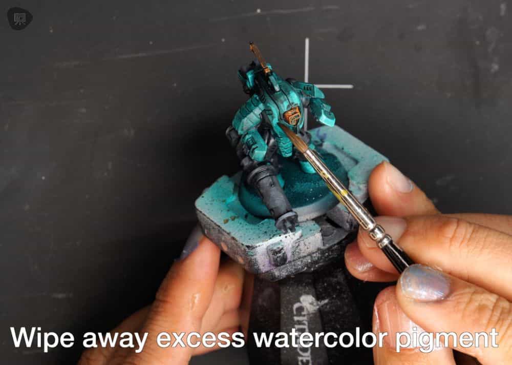 How to Shade Panel Lines and Recesses with Watercolor (Fast and Simple) - wiping away excess watercolor pigment from the model