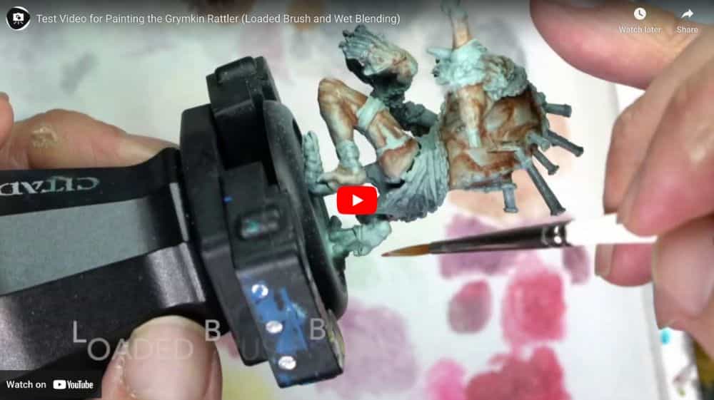 test video demo screenshot showing miniature painting close up